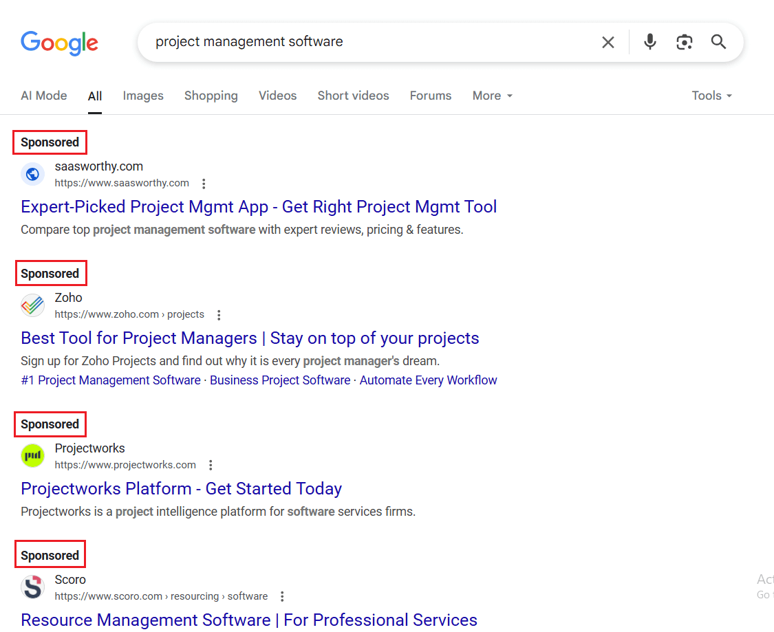 The search engine results page shows paid search ads at the top.
